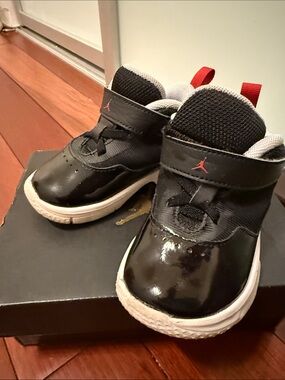 Kids Black and Red Jordan Sneakers